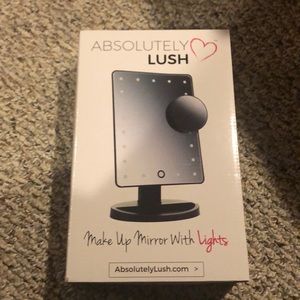 Makeup mirror with lights